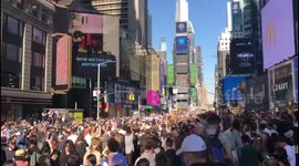 Times Square crowds celebrate Joe Biden's presidential victory