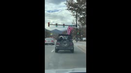 American flag waved through the streets of Boulder Colorado on the day Joe Biden wins the election