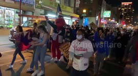 Joyous parade through Chinatown in Philadelphia celebrating the election of Joe Biden and Kamala Harris