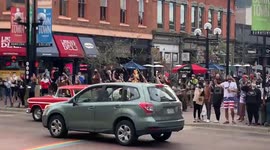 People celebrate the election results in Boulder Colorado