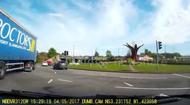 Lorry takes car out