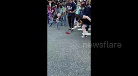 Biden supporter seen stomping on red cap during celebrations in New York