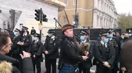 Police officer pushes veteran trying to reach The Cenotaph on Remembrance Sunday