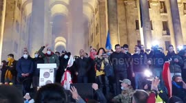 Georgia: Protesters Countdown For Curfew Start In Front Of Parliament