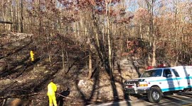 Firefighters tackle hillside brush fire in Northumberland County, Pennsylvania