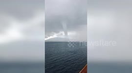 Waterspout appears off coast of Philippines