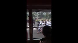 Members of Indonesia 'Islamic Defenders Front' confronts with police as they are marching to airport