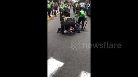 Peruvian police forcefully arrest man amid protest against impeachment of President Martín Vizcarra