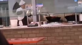 University canteen worker in China captured washing mop in wok