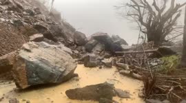 Landslide blocks road in Philippines as Typhoon Vamco hits