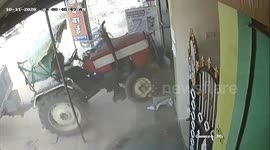 Pedestrian survives horrific crash as out-of-control tractor ploughs into shop in India