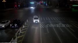 Car moves in wrong direction on road as driver falls asleep at the wheel in eastern China