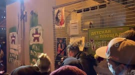 Belarusians bring candles and flowers to pay respects to a peaceful protester killed by police in Minsk