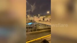 Protesters clash with police and surround government building in Peru