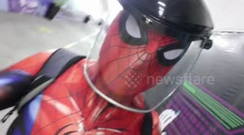 Spider-Man Poses Next To Christmas Tree In The Philippines