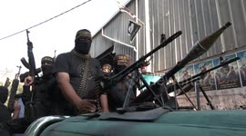 Palestine Islamist group parades through Gaza after commander's assassination