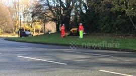 Remote controlled grass cutting on a roundabout