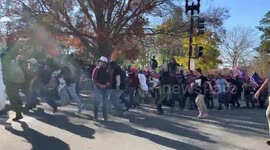 'Proud Boys' charge after alleged 'Antifa' at the MAGA March in Washington D.C.