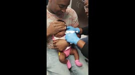 Baby's funny reaction to getting her ears pierced