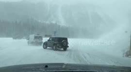 Heavy snowfall buries highways in Colorado mountains