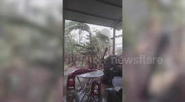 Strong winds and rain from Typhoon Vamco batter central Vietnam