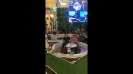 Diners surrounded by Koi carp at unique cafe in Vietnam's Ho Chi Minh