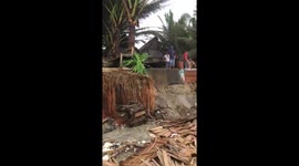 Property damage and debris as Typhoon Vamco batters Vietnam