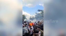 Riot police fire tear gas to disperse protesters in Thailand
