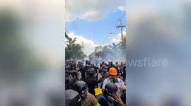 Riot police fire tear gas to disperse anti-government protesters in Thailand