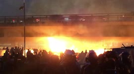 French police remove over 2,000 people from makeshift migrant camp near Paris