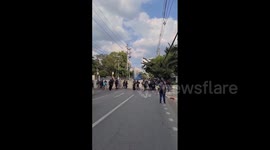 Thailand: Police Use Water Cannons To Disperse Protesters Outside Parliament