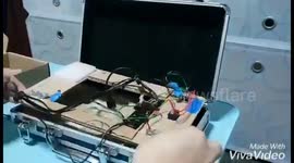 Singapore tech whizz builds functional gaming console inside briefcase