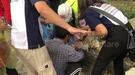 Injured Protesters Treated After Police Fire Chemical Water Cannon