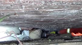 Chinese firefighters rescue 85-year-old man trapped between narrow walls