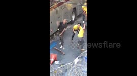 Royalists clash with pro-democracy protesters clash in Bangkok in violent skirmish