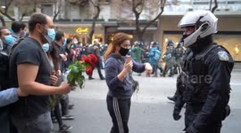 Police disperse crowds of protesters defying public gatherings ban in Greece