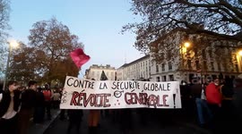 Thousands of French protesters rally against law that would ban filming police officers