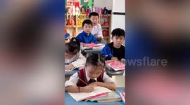 Wholesome moment class cheers for boy who achieved full marks in exam