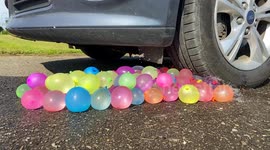 Absolutely popping ASMR video of water balloons being crushed by a car
