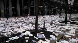 Paris avenue littered with leaflets as garbage collectors go on strike