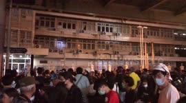 Thai protesters graffiti police headquarters in Bangkok