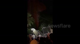 Thailand: Protesters Throw Paint And Glass Bottles On Police Headquarter Wall In Bangkok