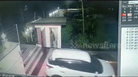 Drunk driver in India crashes through security gate, gets shot at by guard