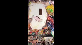 US artist mixes paints to match colour of chocolate and sweets in 'therapeutic' clips