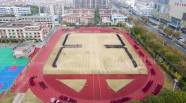 Almost 2,500 students in China form impressive moving patterns in exercise drills