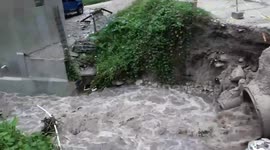 Fast flowing water rushes through Honduras after Hurricane Iota