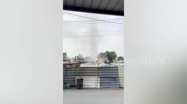 Scary dust devil tornado rips through lorry park in Taiwan