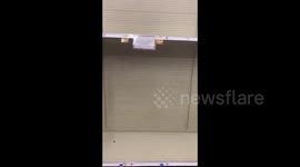 New wave of panic buyers in the US strip shelves bare of essential items
