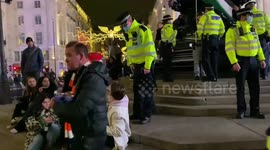 Police disperse protesters from Eros in Piccadilly Circus for breaching lockdown rules