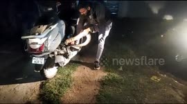 Huge python found hiding inside motor scooter in northern India